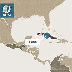 Identifying Cuba on a world map.