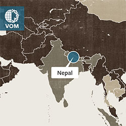 Identifying Nepal on a world map.