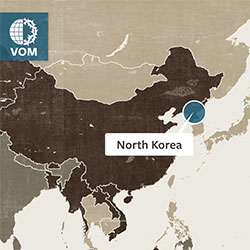 Identifying North Korea on a world map.